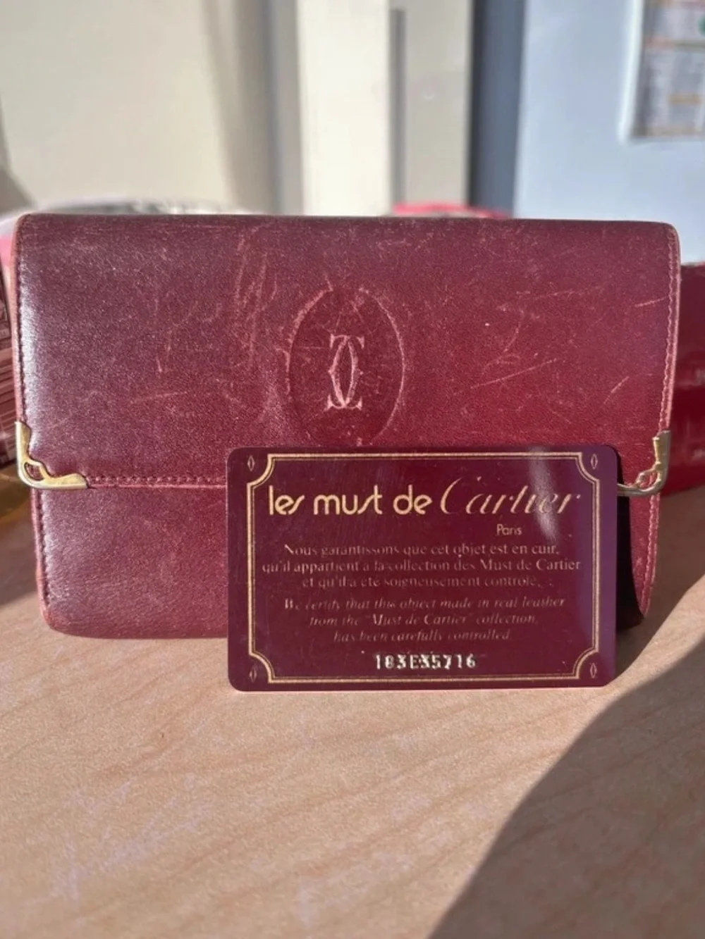 Cartier Burgundy Leather Wallet with Gold-Tone Corner Accents